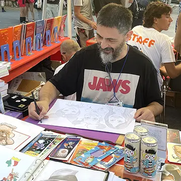Marco Martellini realizza una caricatura – Rimini 2026