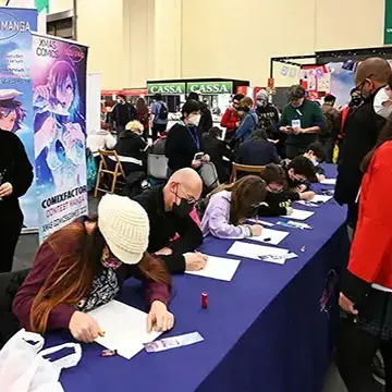 Torino Comics, contest di disegno – veduta d'insieme dei partecipanti che disegnano - Torino 2021