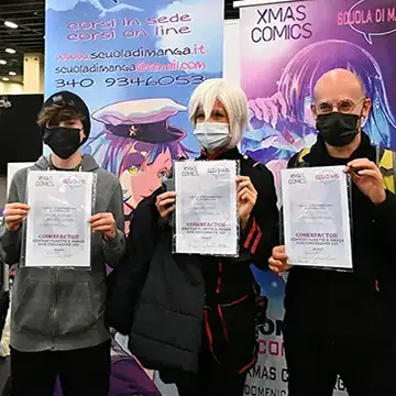 Torino Comics, premiazione vincitori Talent Contest per ragazzi e adulti – I vincitori esibiscono l'attestato