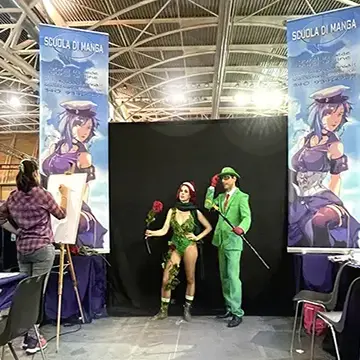 Torino Comics al Lingotto, workshop di disegno allo stand – Alice Passeri ritrae due cosplayer - set fotografico - Torino 2022